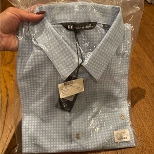 Travis Mathew’s short sleeve shirt. Size XL